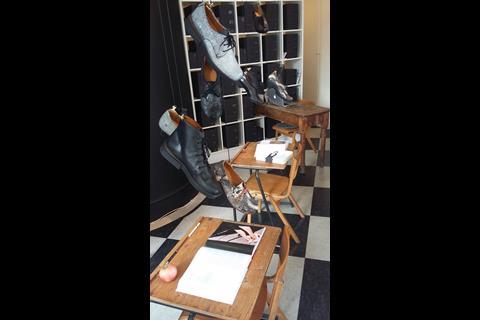 Tracey Neuls shoes hang from the ceiling